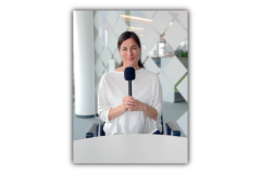 A picture of Valentina holding the microphone.