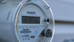 This image shows a smart electricity meter measuring energy consumption.