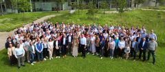 A group picture of the whole CODICO team infront of the office and warehouse building.
